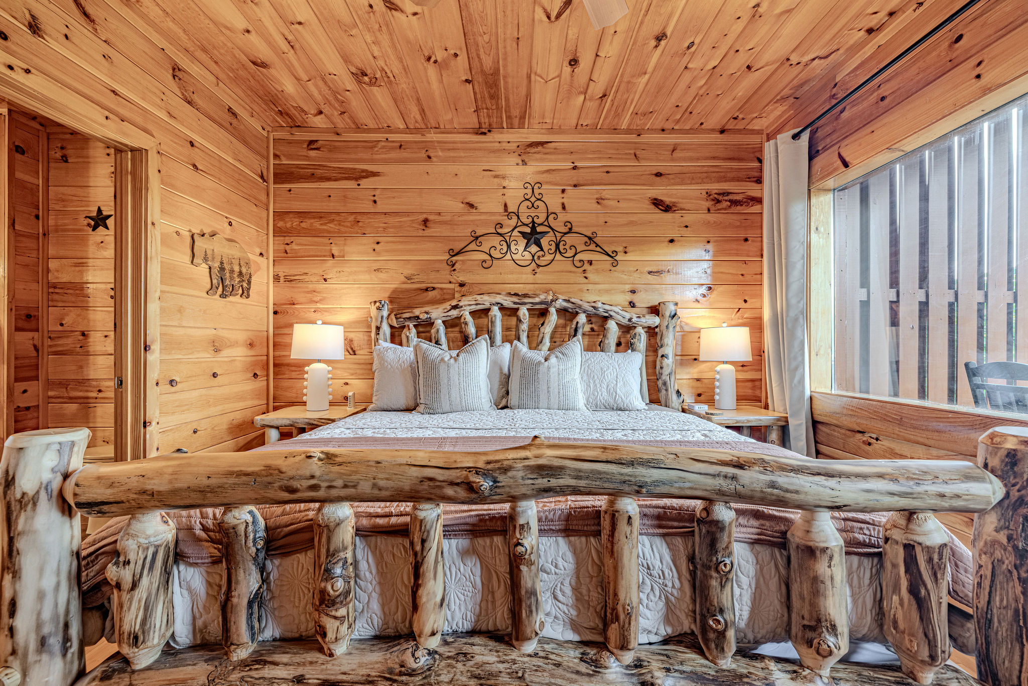 Second suite with rustic King log bed.