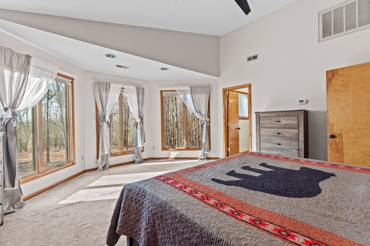 Spacious Bedroom 1 Retreat: Sunlit views and rustic charm for your peaceful getaway!