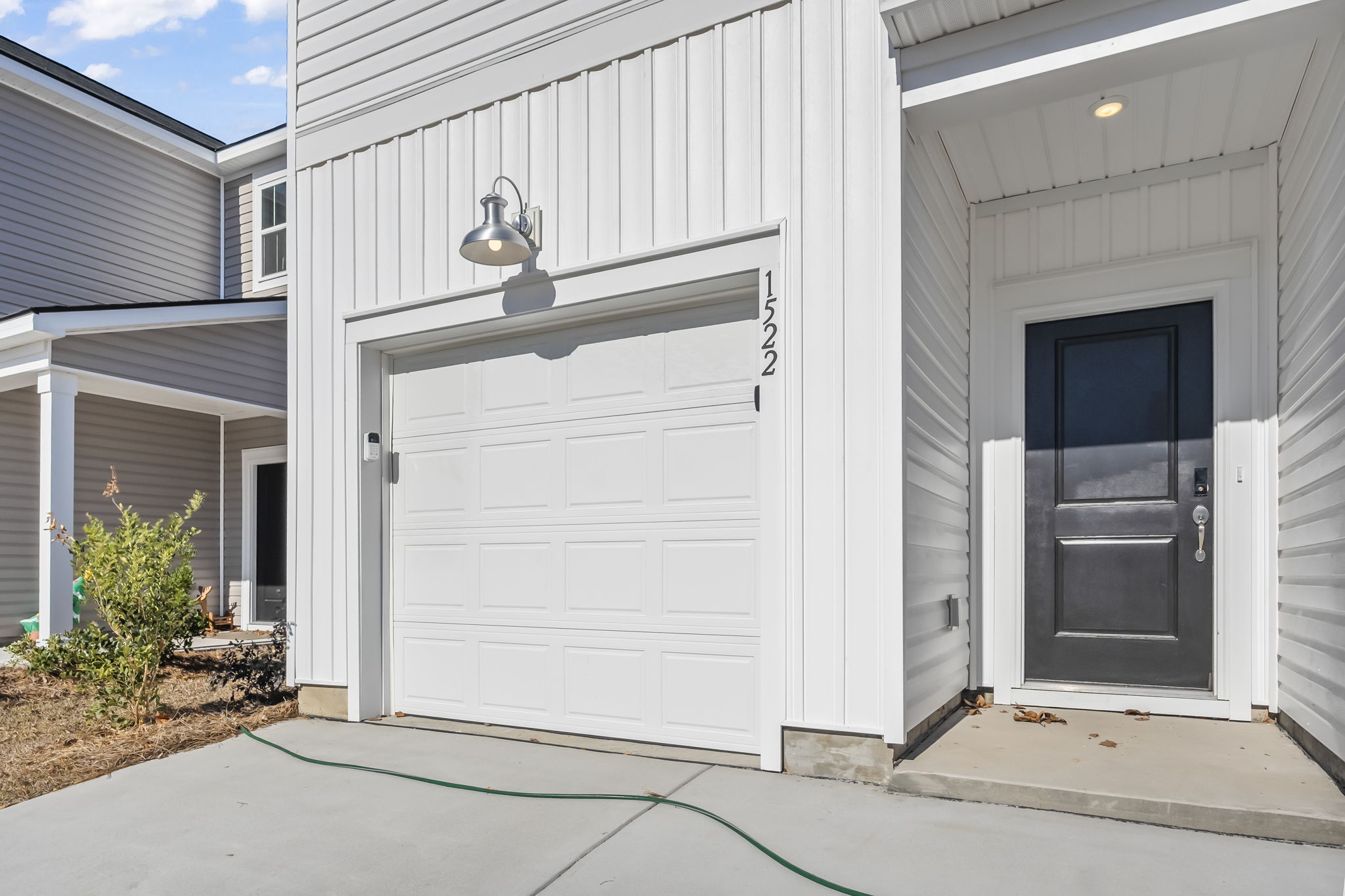 One car garage and room for two more cars in the driveway