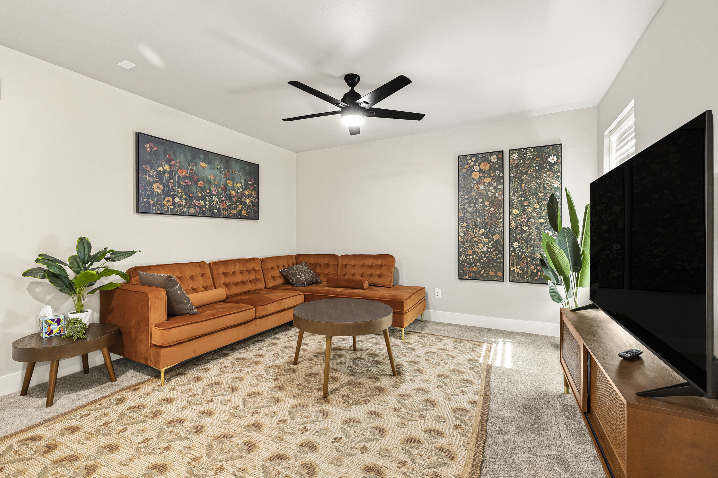 Upstairs living room with lots of natural light.