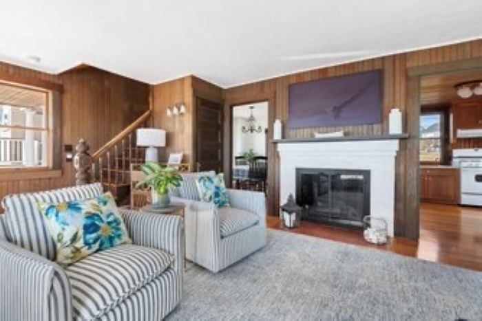 Relax in this inviting living room with cozy seating and classic coastal charm, perfect for unwinding after a day by the ocean. 🌊