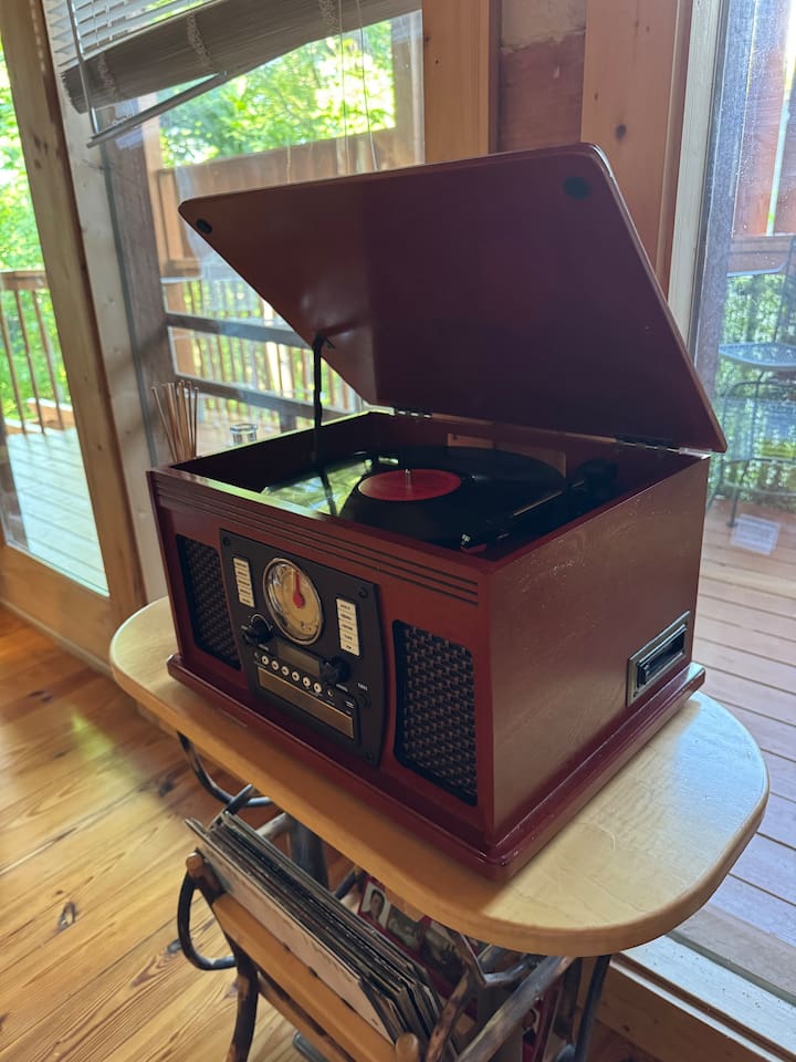 Vintage record player, radio, CD player, and cassette player  