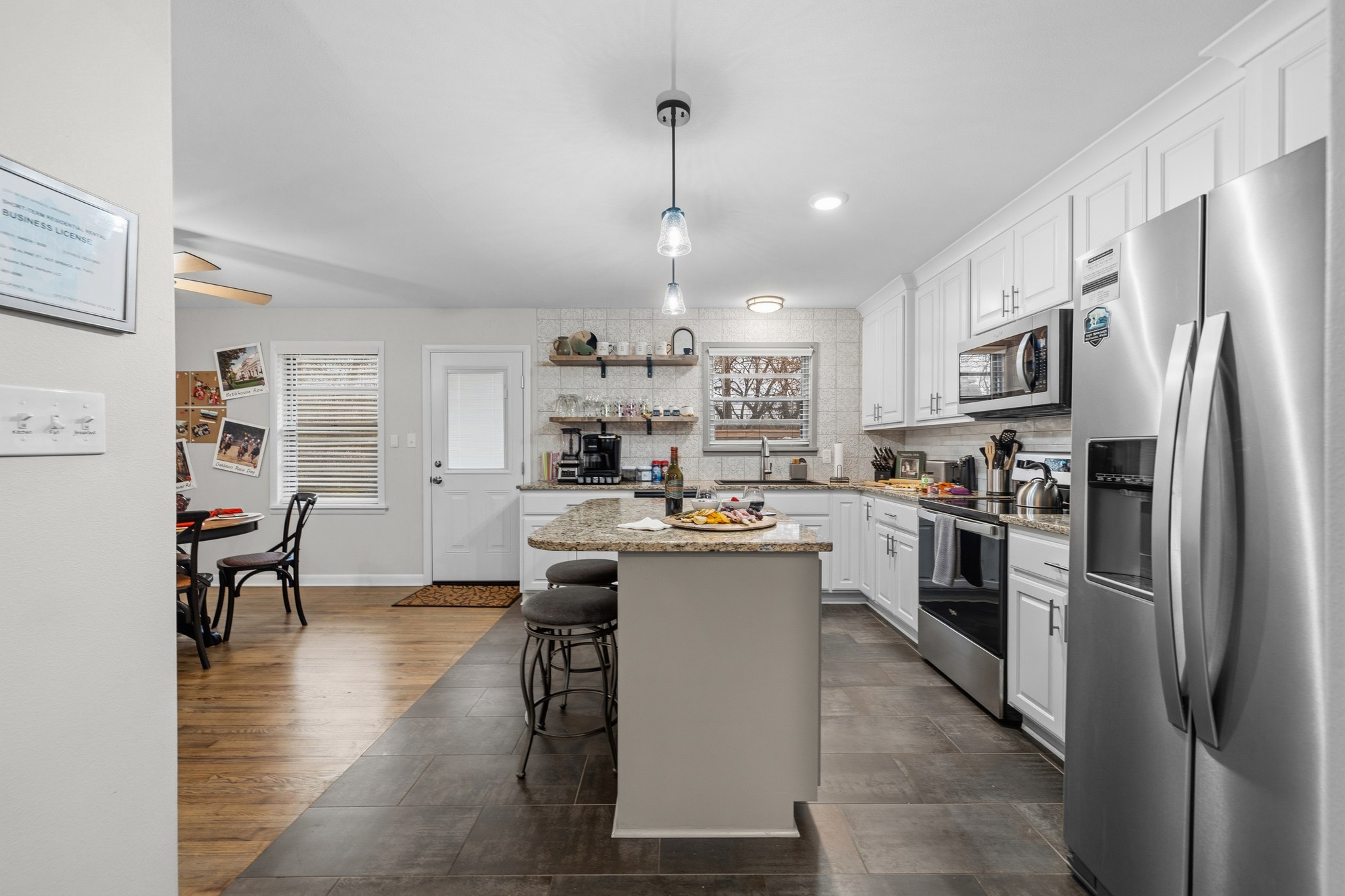 Cook for the whole crew — a granite island with bar seating, full-size fridge, and room for three sets of hands at once.