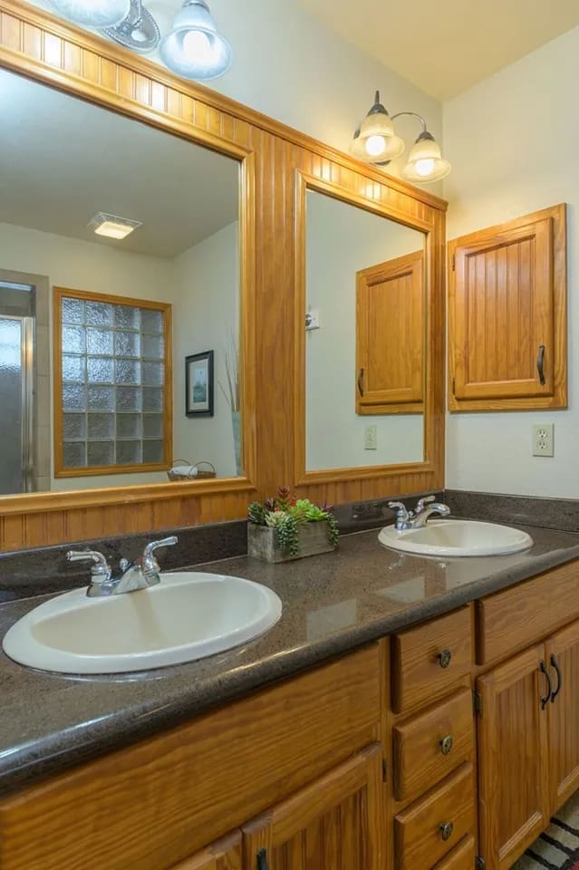 Master bath with double vanity and walk-in shower with bath toiletries provided (2nd/main floor) 