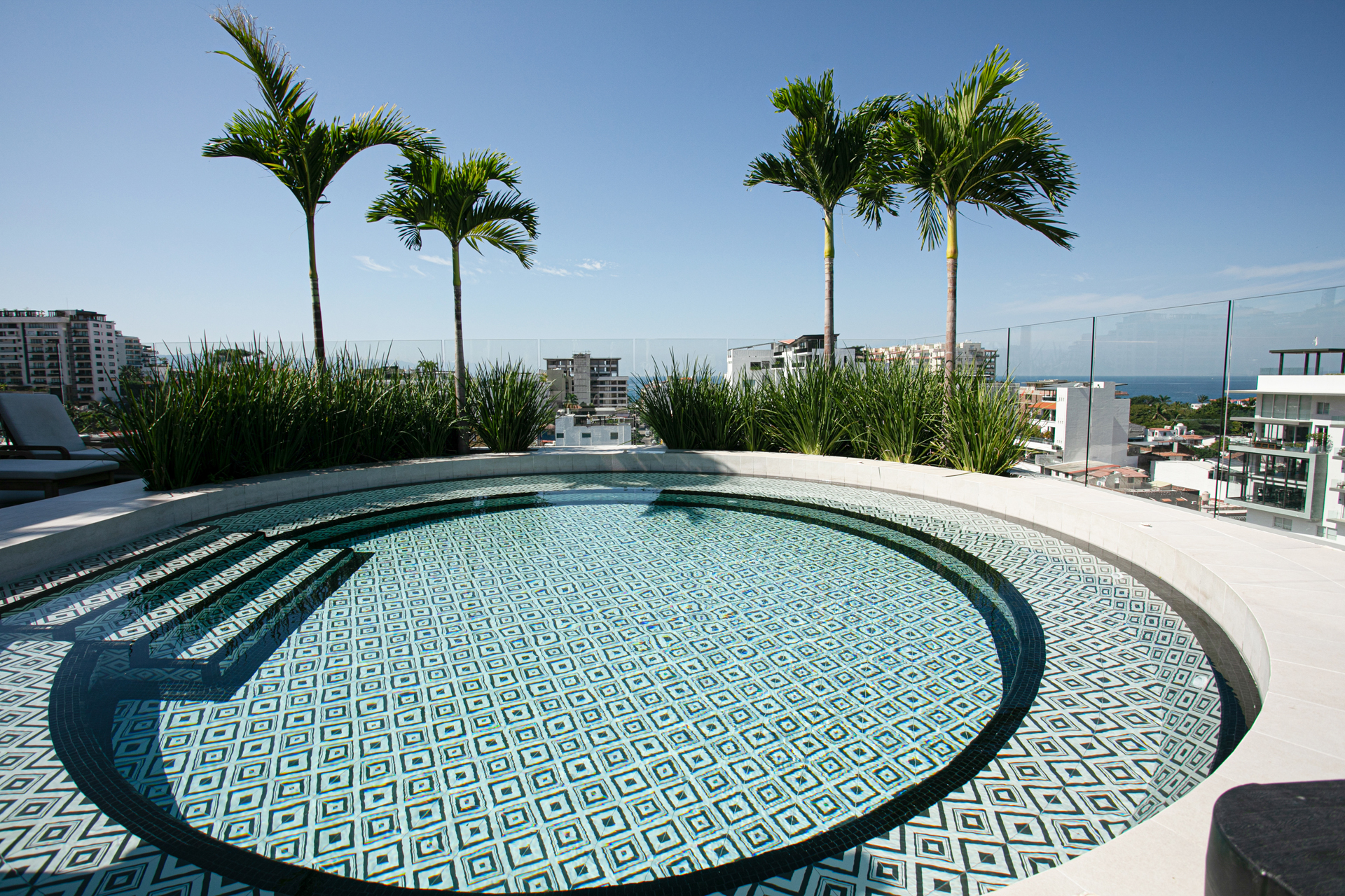 Unwind in Puerto Vallarta’s largest rooftop hot tub with sweeping views of the mountains, city, and Bay of Banderas.