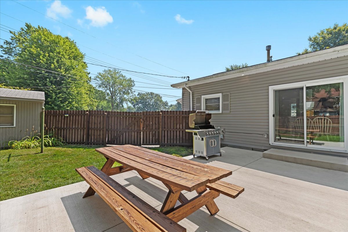 Backyard patio with picnic table for outdoor dining