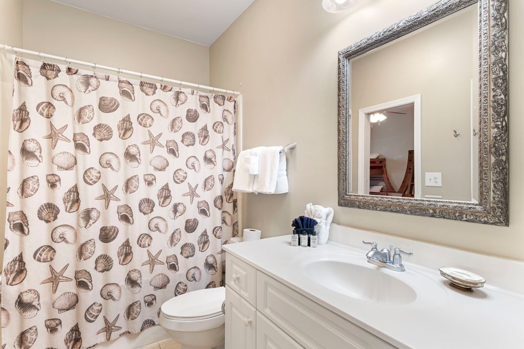 Second Floor: Bathroom 3 – Full ensuite bathroom with tub/shower combo.