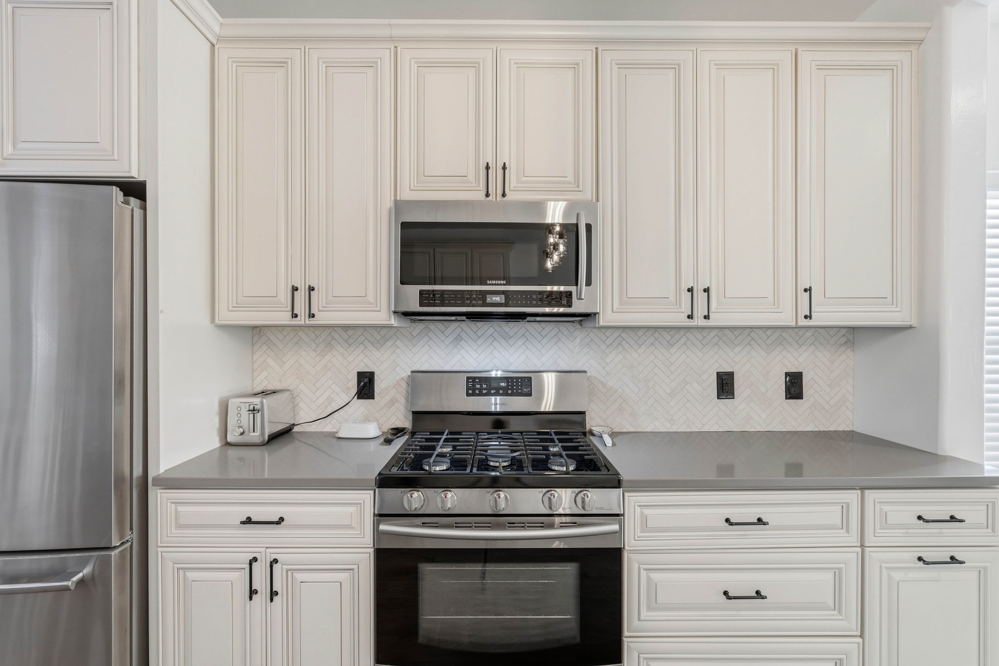 Kitchen with Gas Range and Microwave