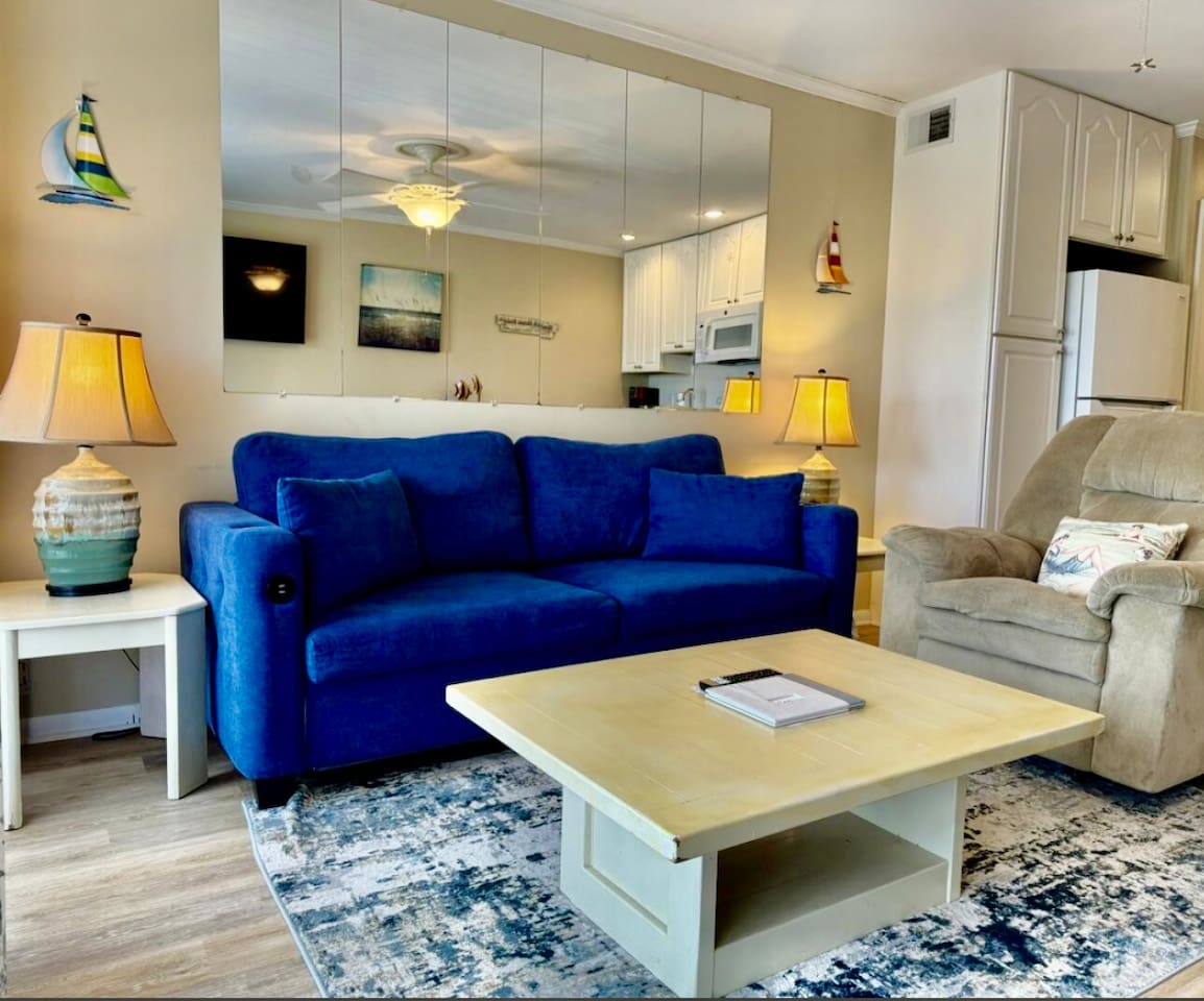 Living room with blue sofa