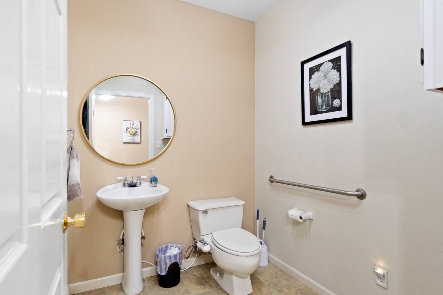 Full bathroom with modern fixtures, a spacious shower, and sleek finishes, providing a comfortable and functional space.