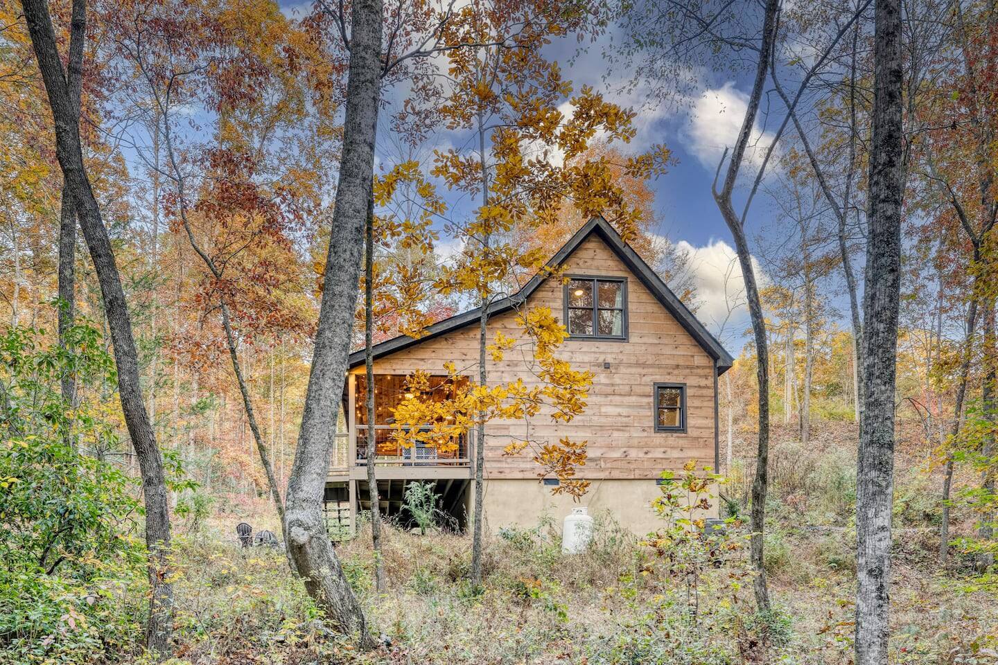 Our cabin's exterior stands as a rugged yet inviting retreat, nestled amidst nature's embrace, offering solace and adventure in equal measure.