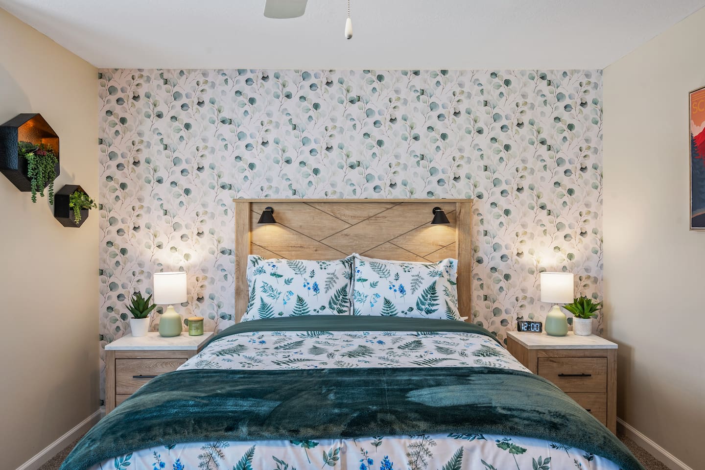 This bedroom is a serene retreat 🌿🛏️ — the nature-inspired wallpaper and bedding bring the outdoors in, while soft lighting and cozy textures make it the perfect spot to unwind. Peaceful, fresh, and beautifully styled!