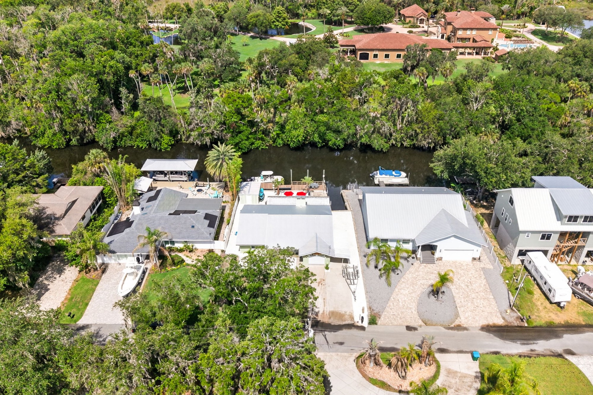 Aerial view of the property and neighborhood