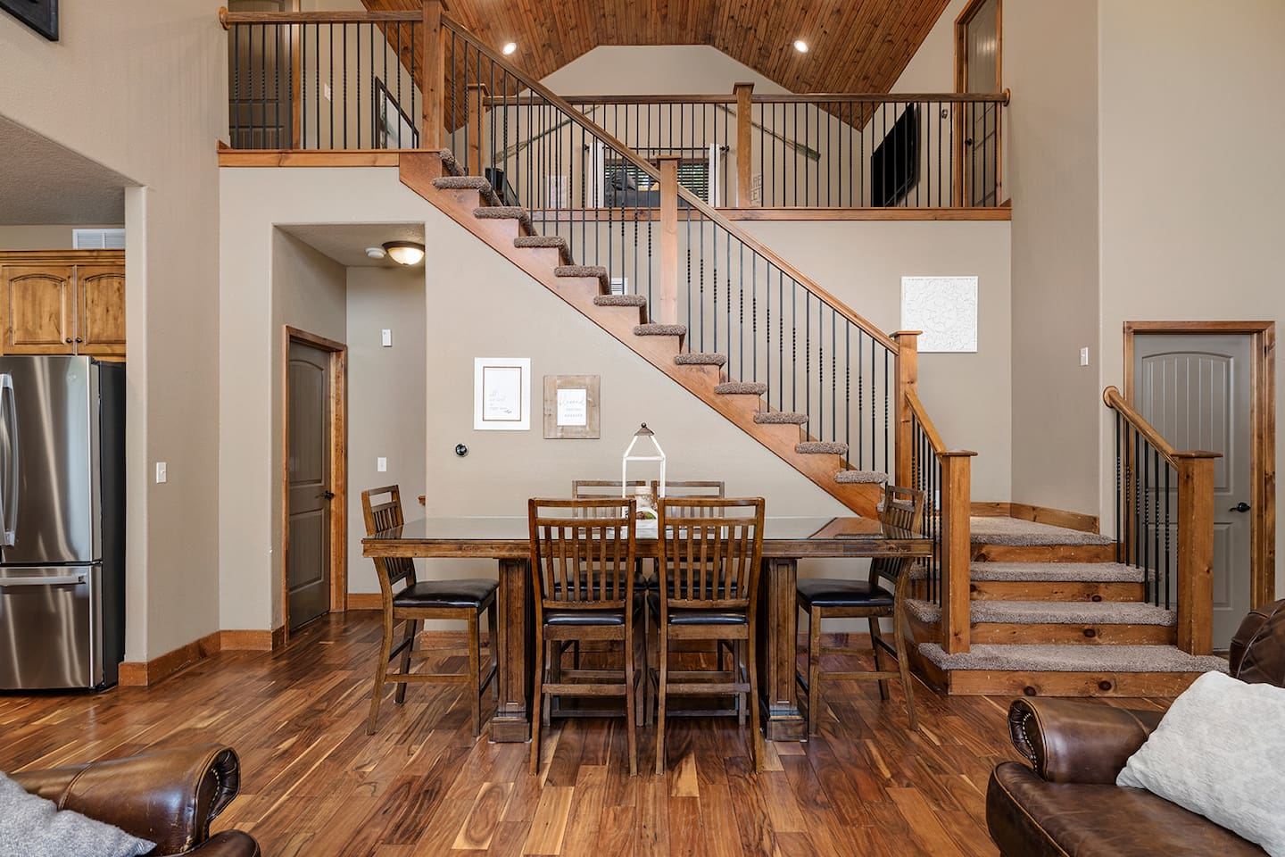 Large dining table with seating for 10, 4 more at the island, and a small dining table with seating for 3 for 17 total