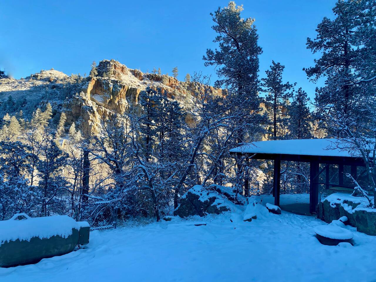 View of the backyard and rock formations from the master bedroom window.