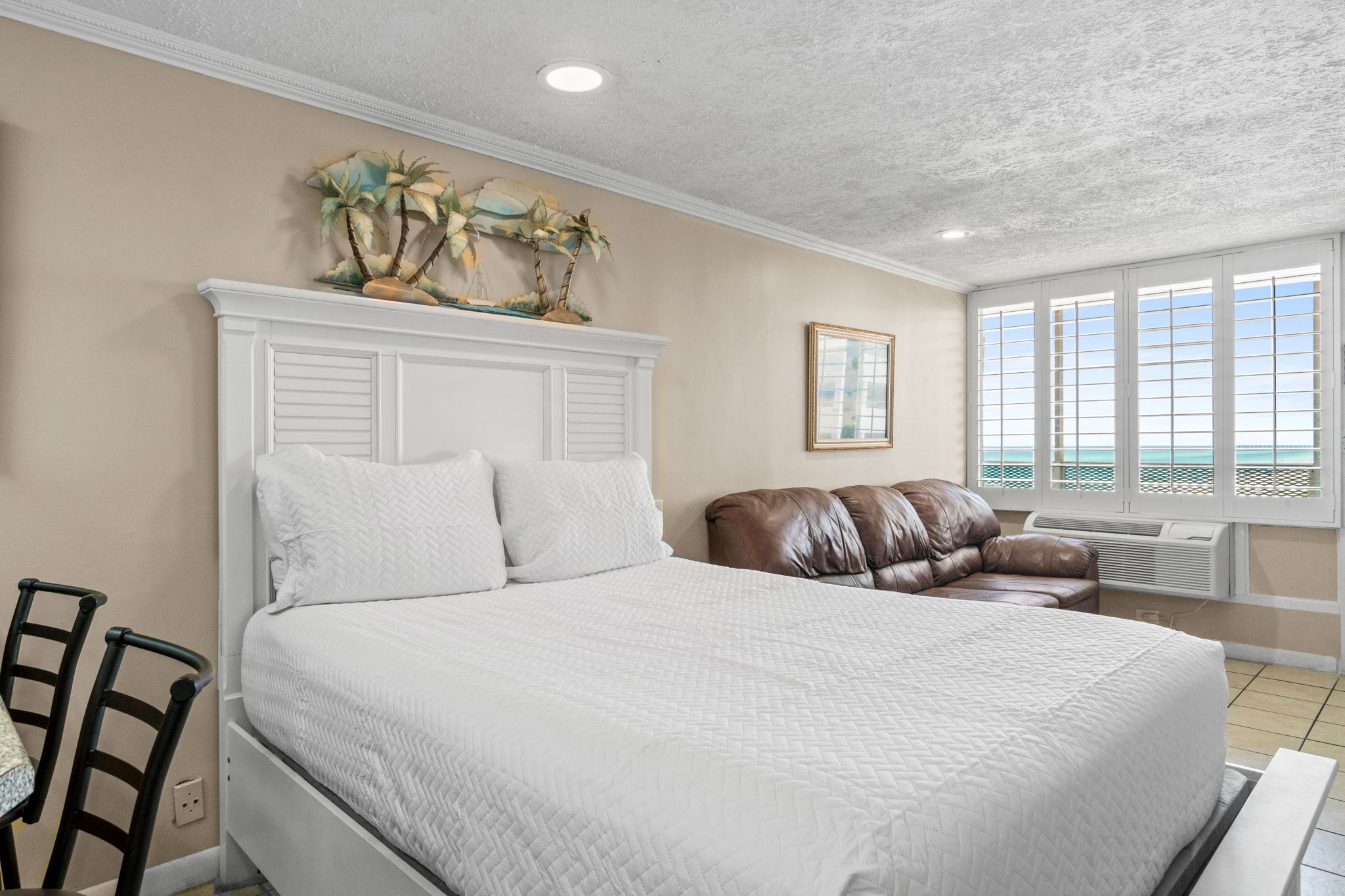 Living Area with Queen Bed and Sleeper Sofa