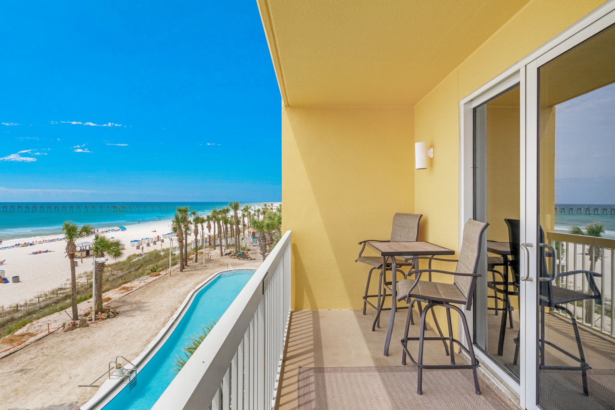 Balcony with hightop chairs for a amazing unobstructed view