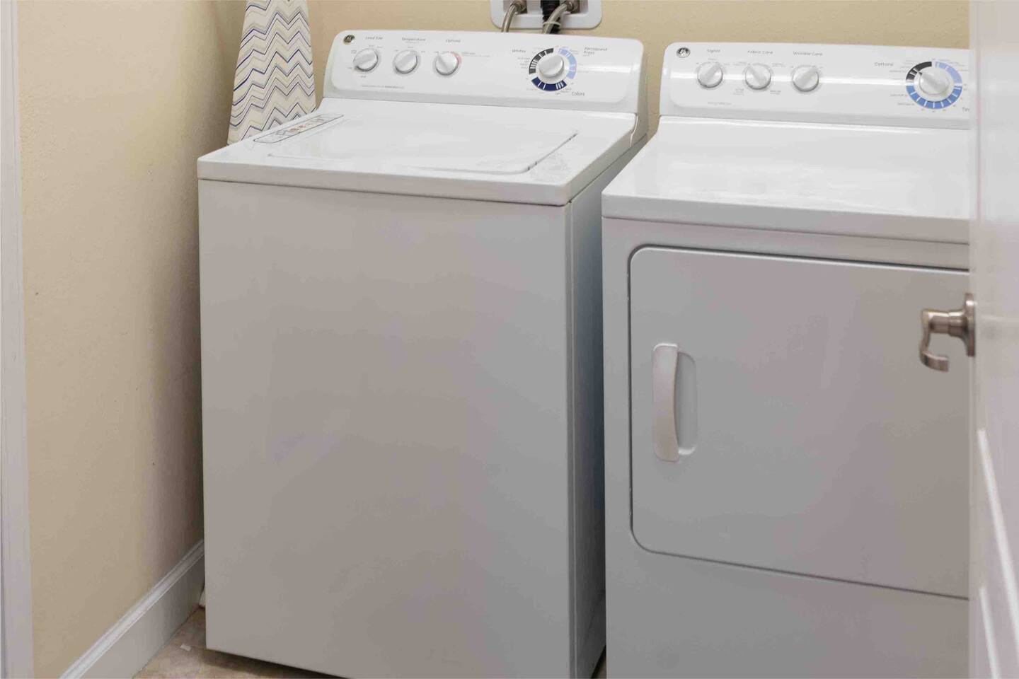 Washer and dryer with ironing board and iron