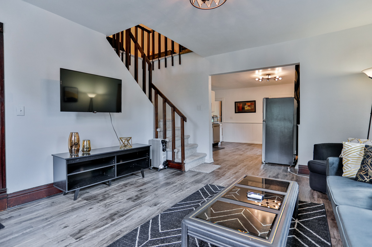 Spacious living room with elegant decor and views