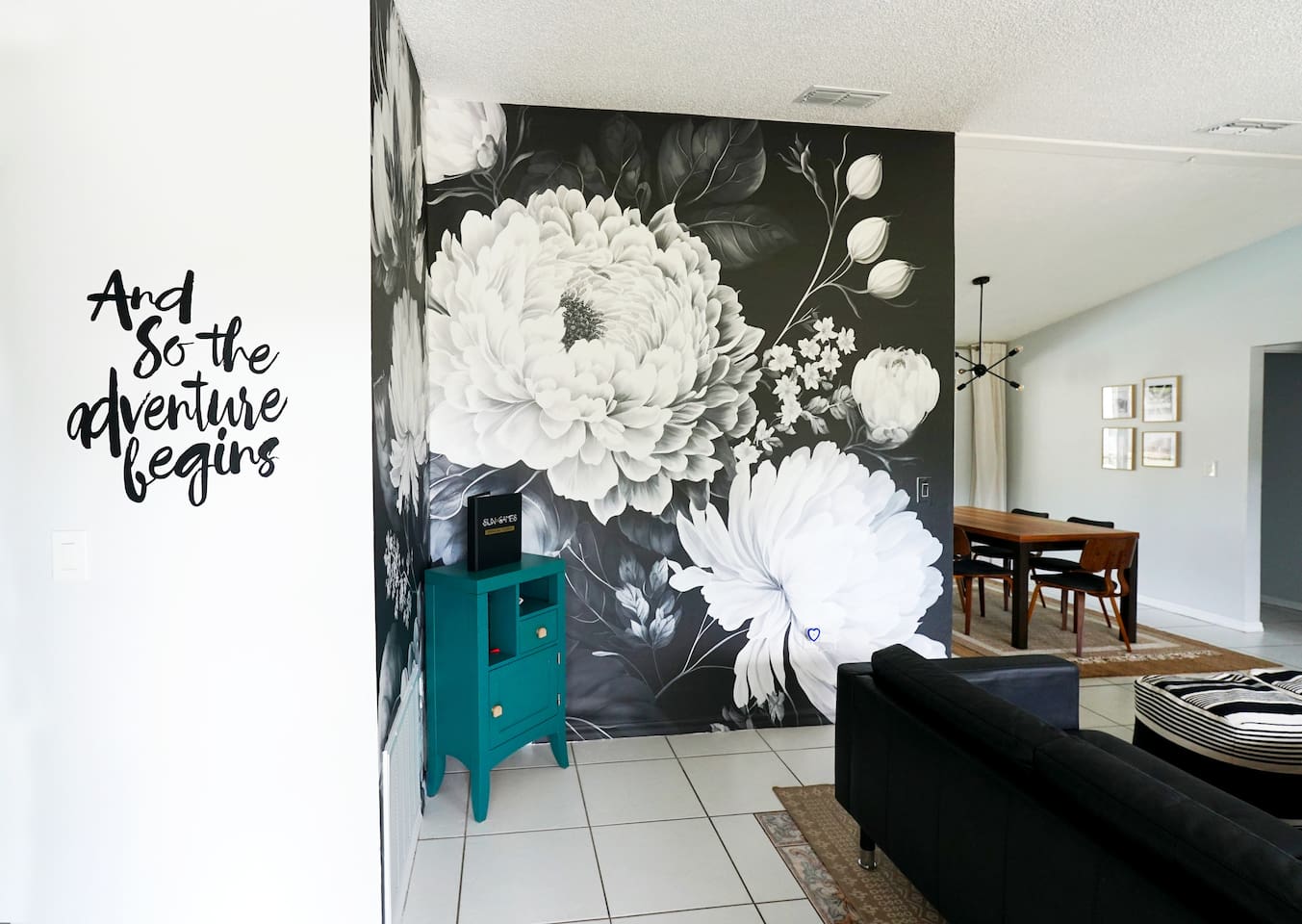 Welcome! And so the adventure begins!
Make your stay unforgettable at this Spring Hill Airbnb! Featuring floral wall mural upon entry #instagramWorthy #springhillairbnb #stylishstay