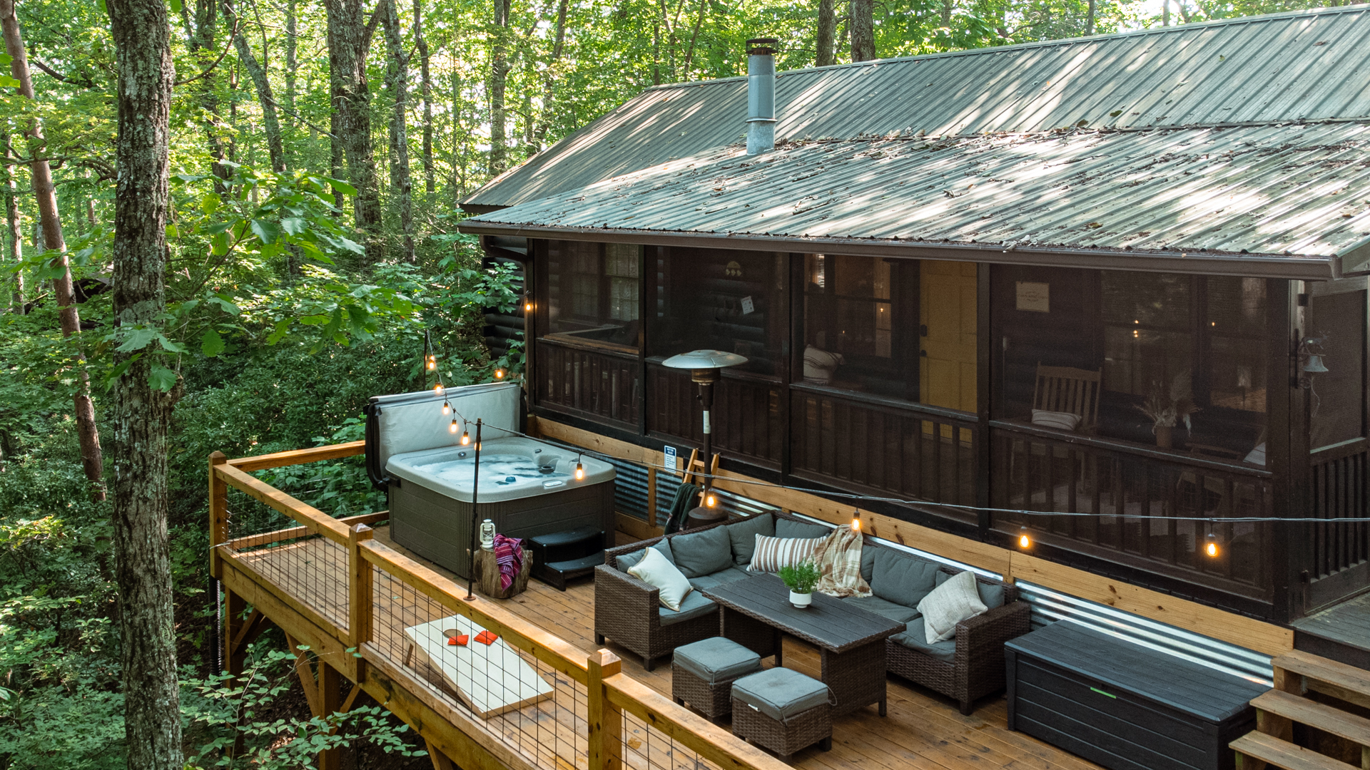 Relax under the trees on the large outdoor deck