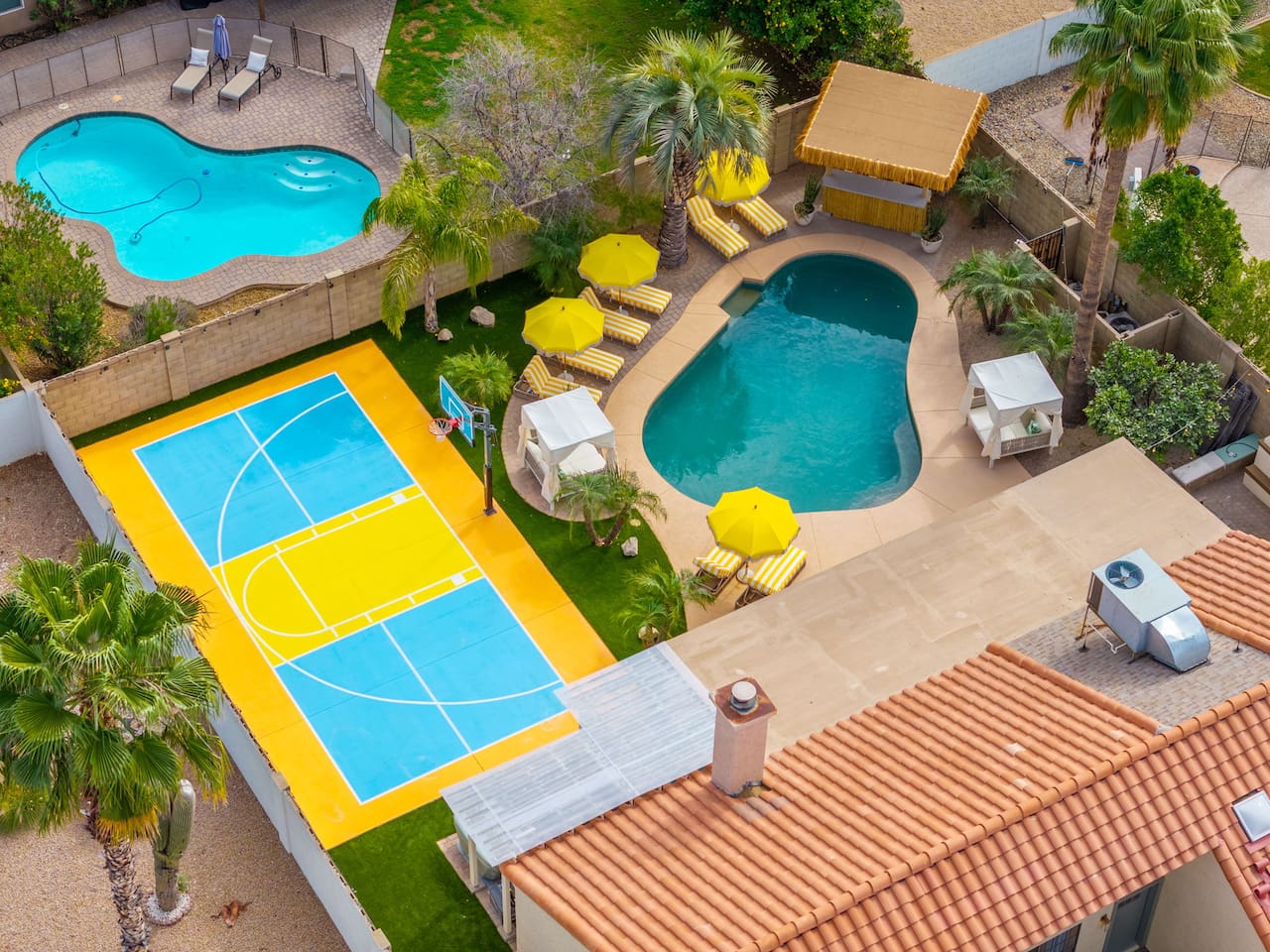 Multiple pools and courts with loungers and umbrellas—ideal for families seeking endless recreation and relaxation options.