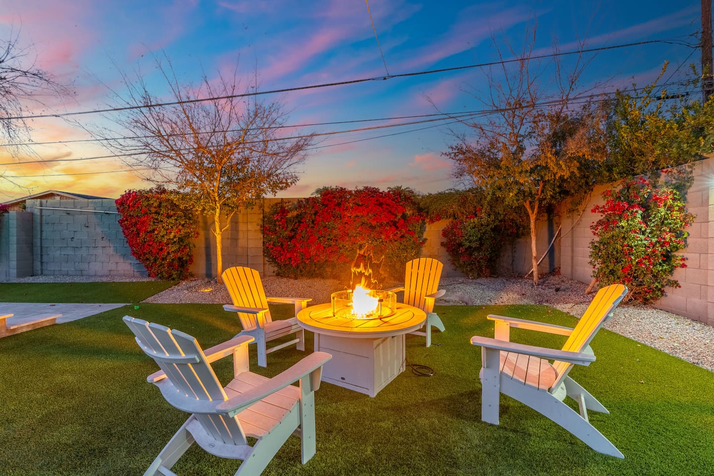Charming 4-seater table by the poolside, ideal for enjoying meals or drinks while soaking in the serene surroundings.