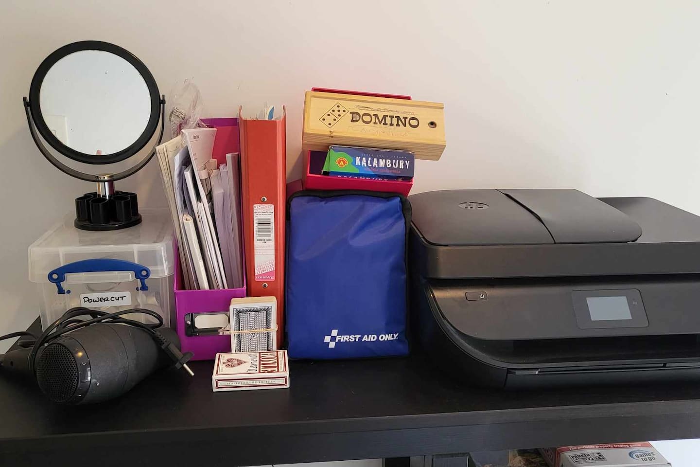 Hairdryer, first Aid Kit, Emergency Information, Printer, small games:
Located in the common area upstairs, shared between the guests.