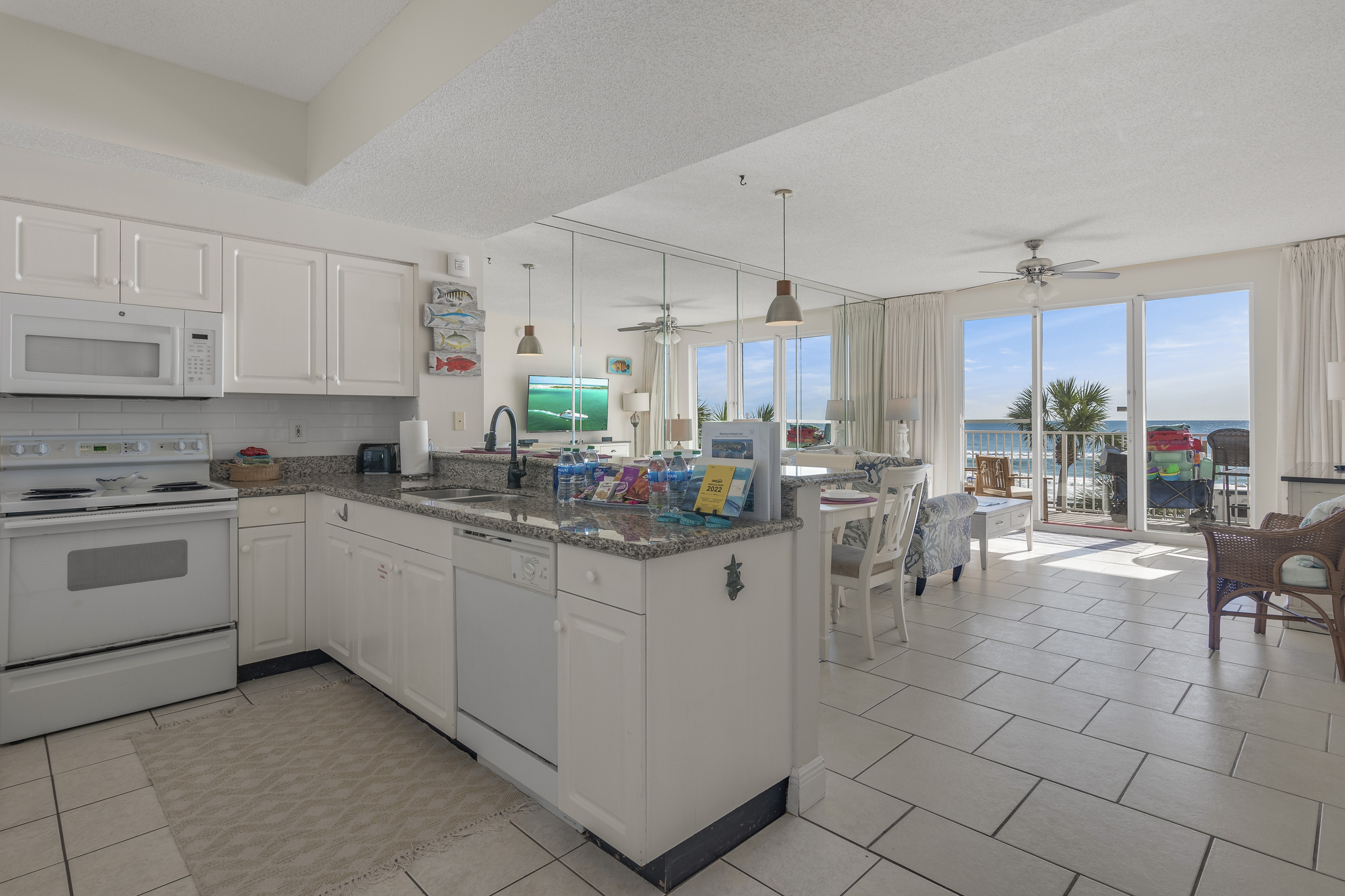 This 2BR/2BA condo has an open floor plan with Gulf views from many angles!