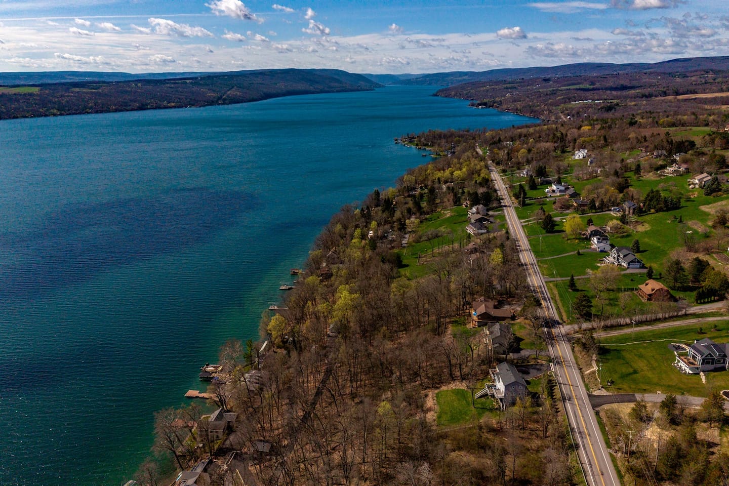 Breathtaking views of Canandaigua Lake, where sparkling blue waters meet rolling hills—perfect for peaceful mornings, sunset strolls, and unforgettable lakeside moments.