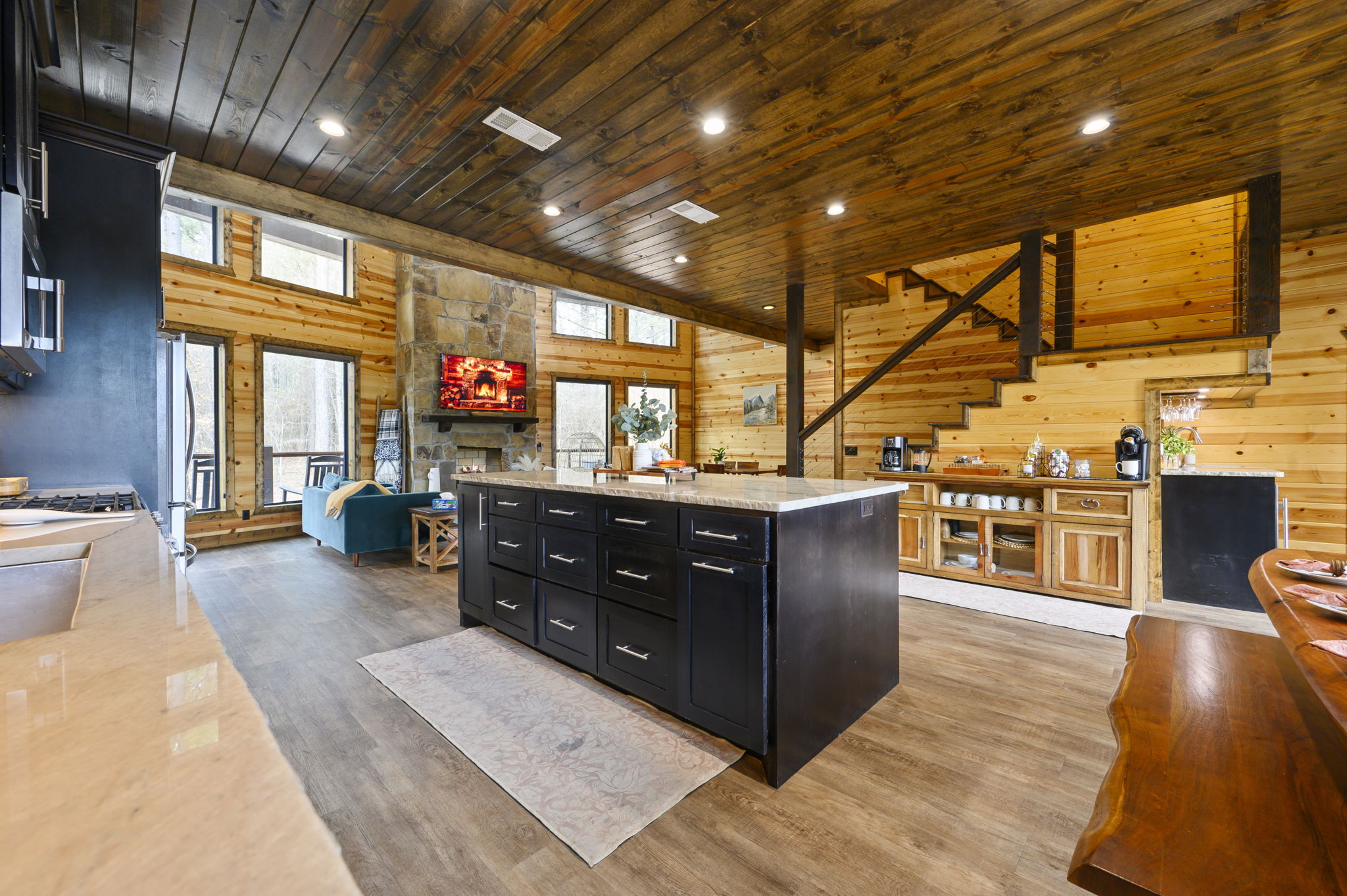 Cook, laugh, and share stories in this chef-style kitchen with premium appliances and open-concept design