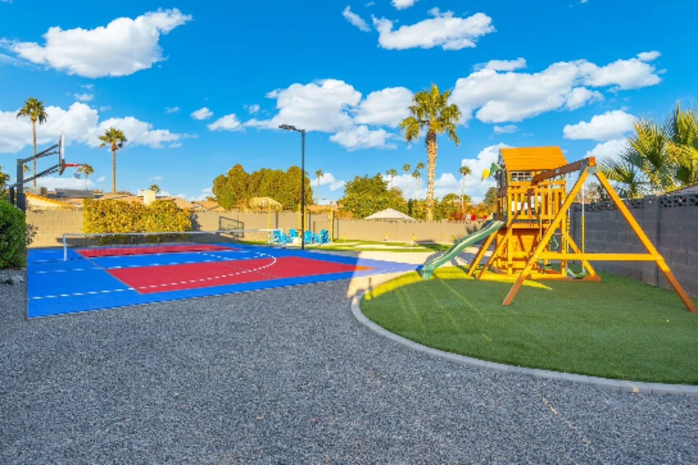 Sport court on one side, play structure on the other, this corner of the yard keeps every age entertained at once.