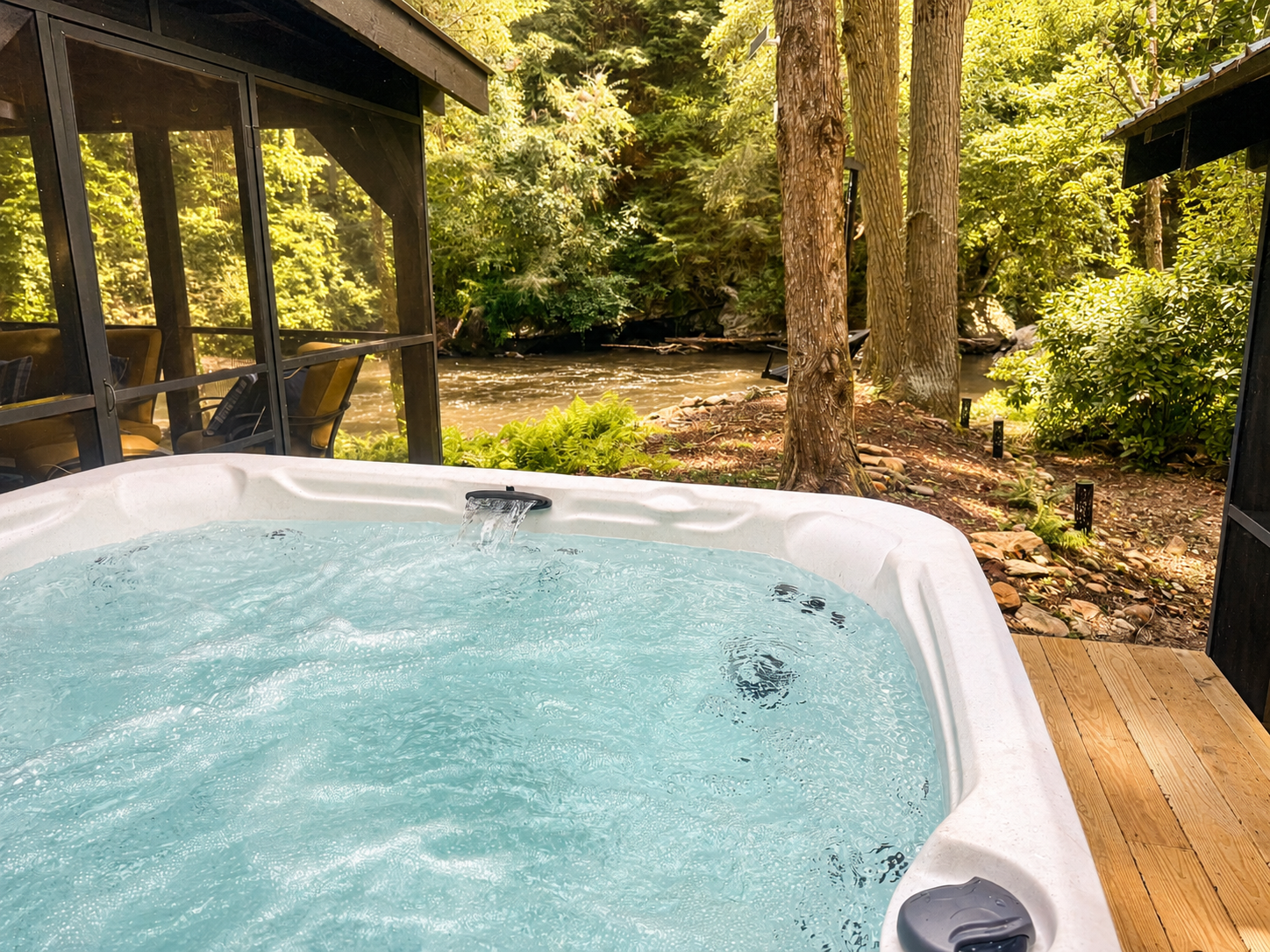 Soak in the hot tub while enjoying peaceful views of the Cartecay River.