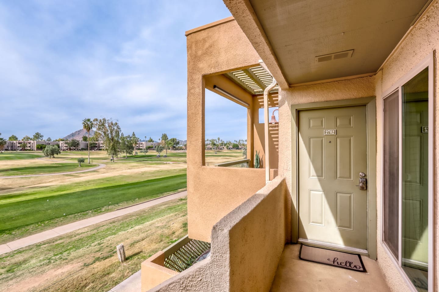 A private covered entry welcomes you home after a day of exploring, with desert skyline views all around.