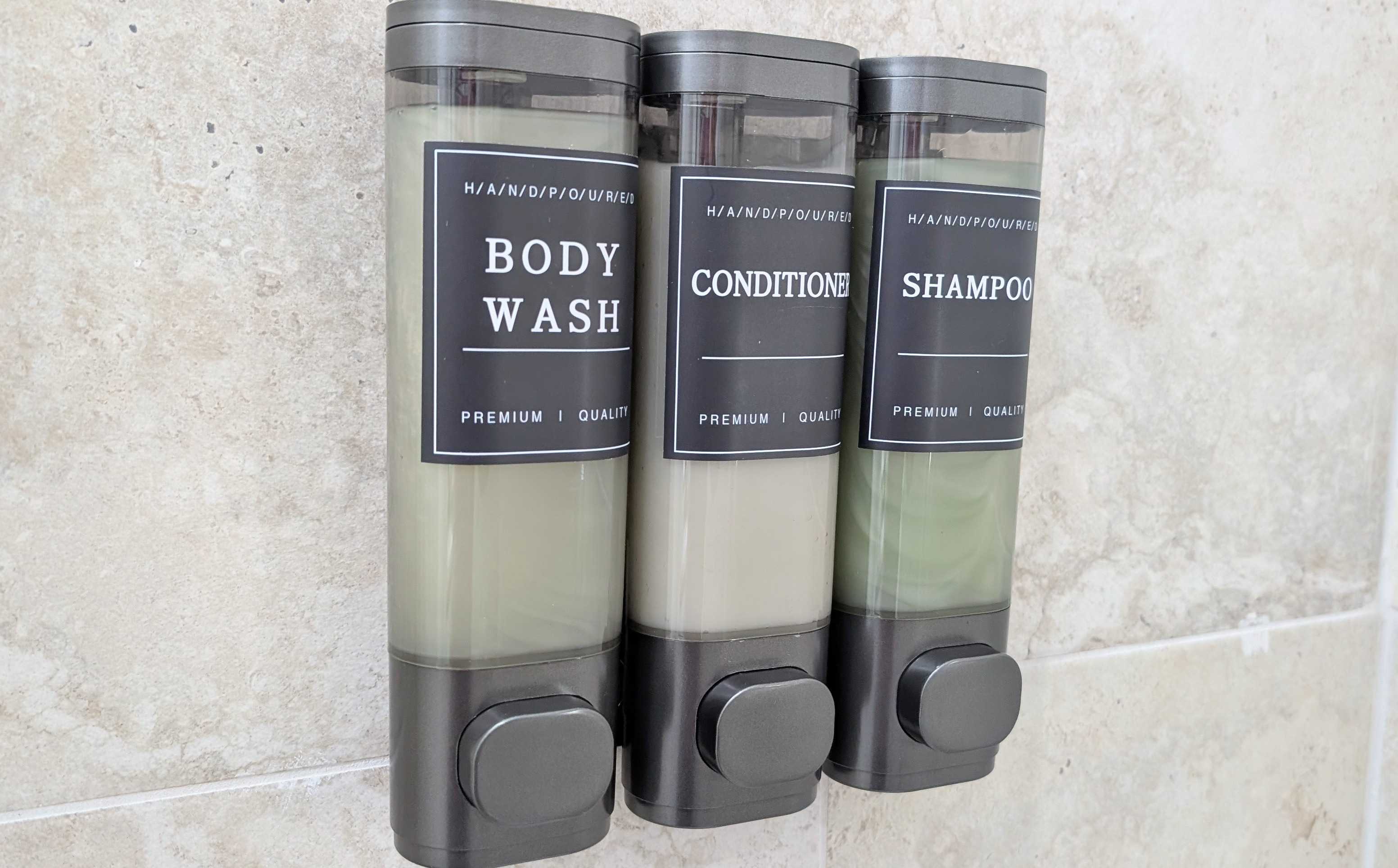 Showers feature complimentary shampoo, conditioner, and body wash.