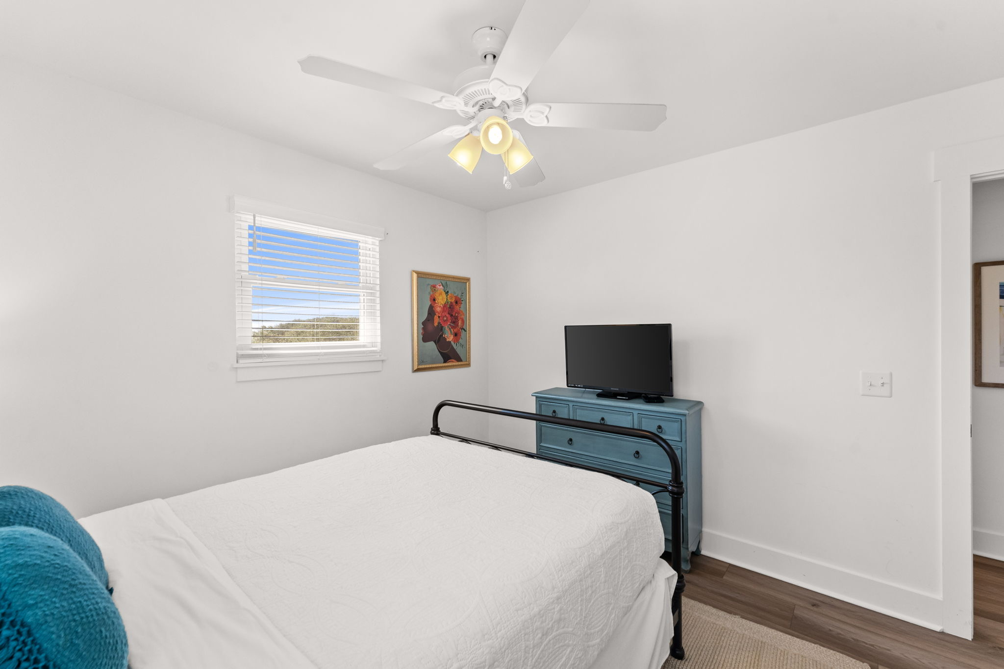 Side B: Spacious 3rd-floor Guest bedroom—a serene and crisp coastal retreat.