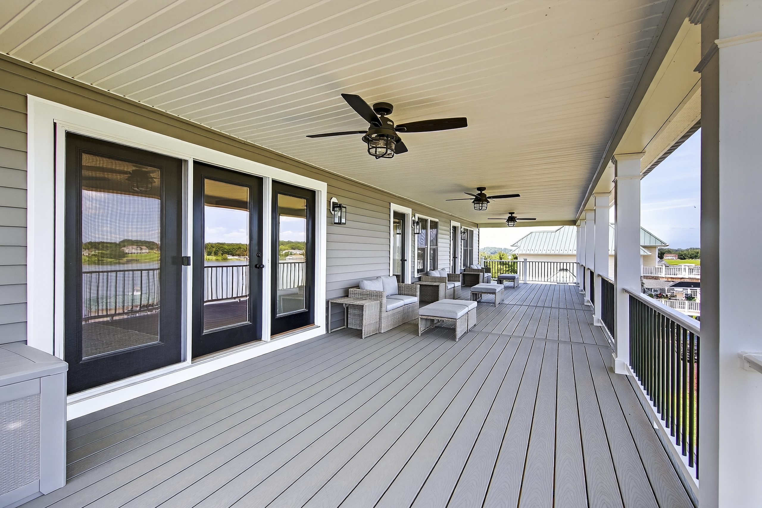 Breathtaking panoramic vistas from a spacious shaded deck, where lake breezes and relaxation come standard.