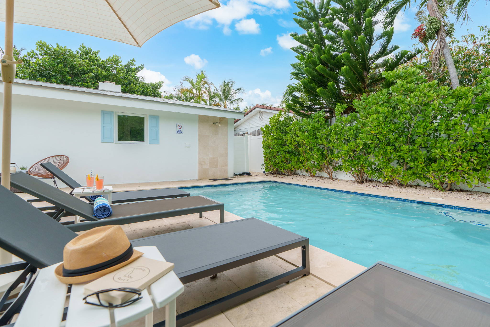 4 lounge chairs sun or shade, outdoor shower