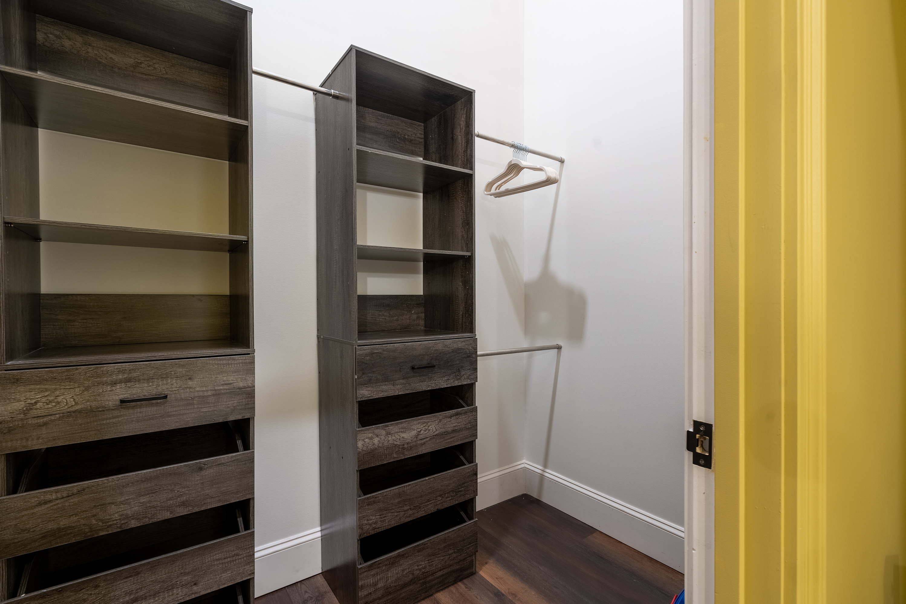 Walk in closet in en-suite bathroom