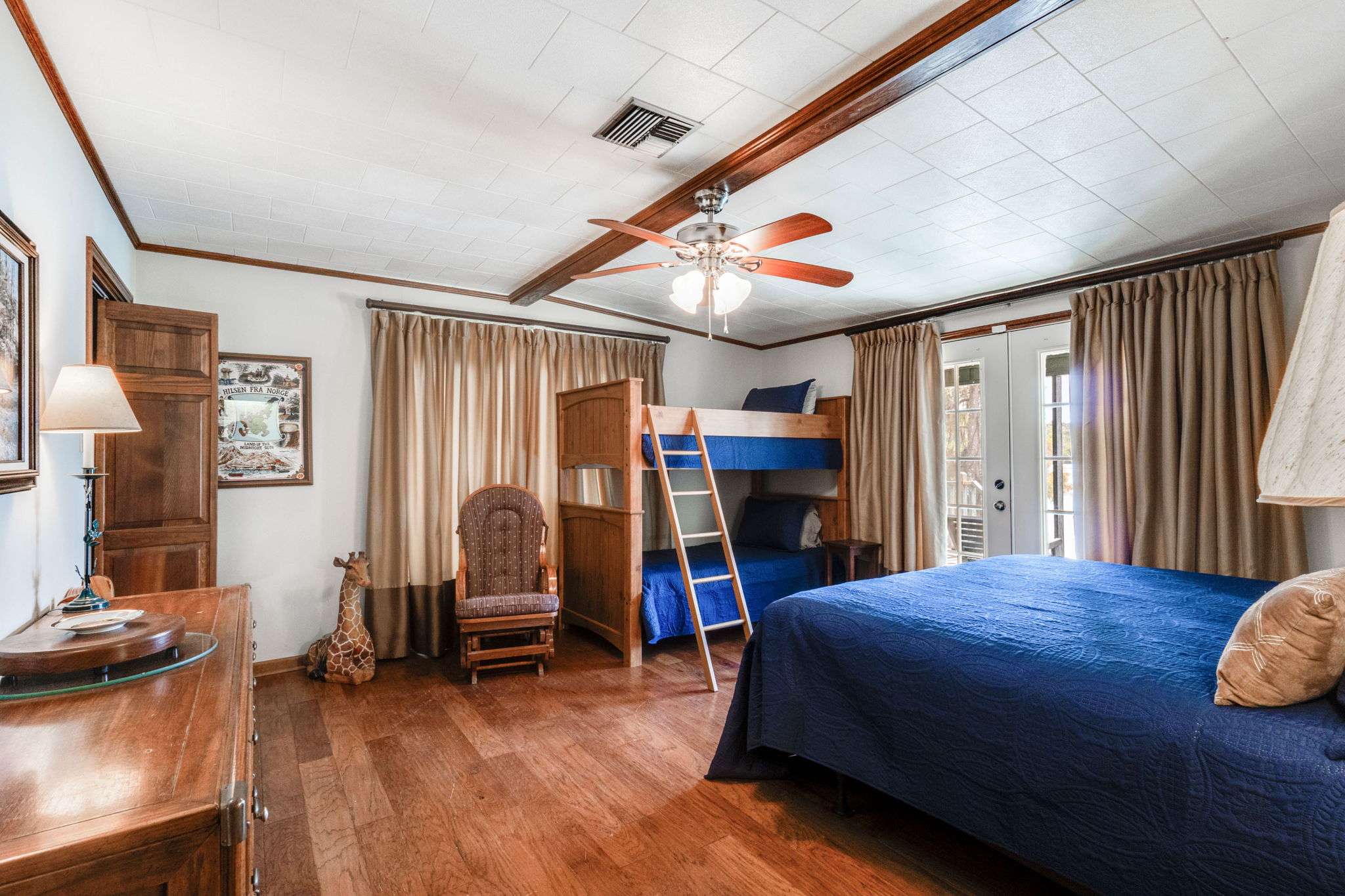 Bedroom 1 w/ Private Porch Area (King Bed & Twin Bunks)