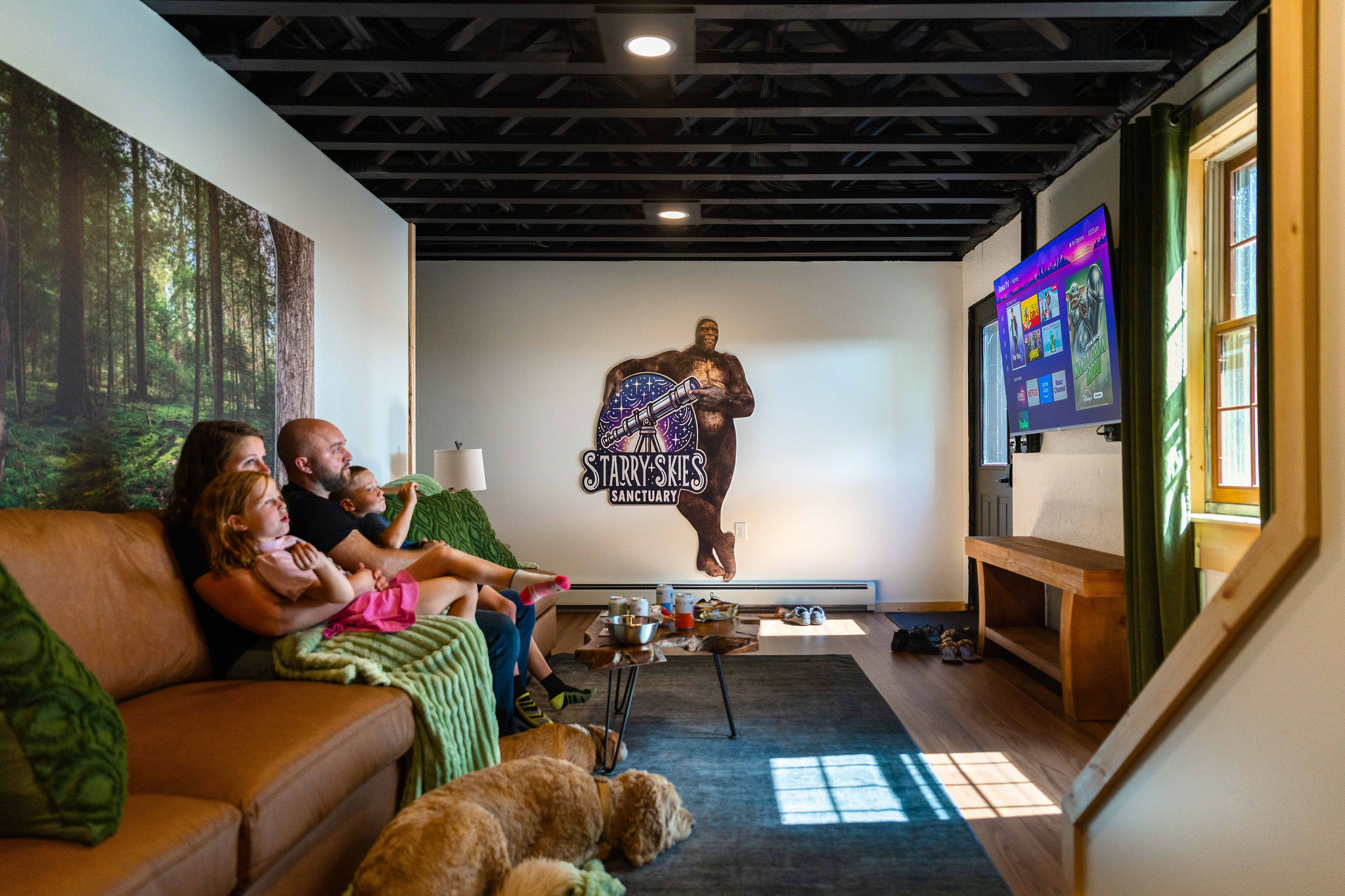 📺 Second living room on the lower level: seating for 6 and a 55" HDTV, so a second family can have their own movie night.
