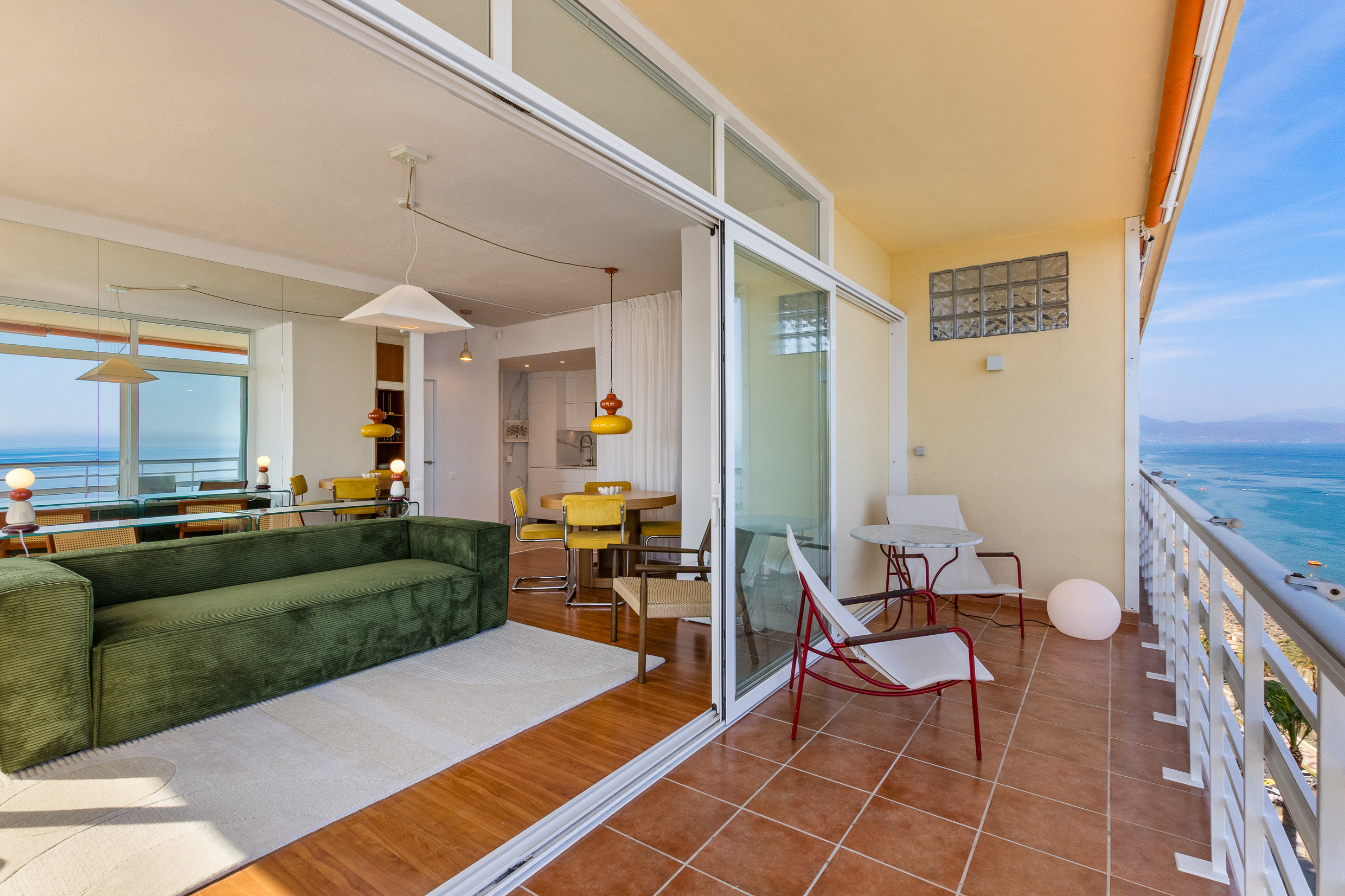 One of the suite's balconies, connecting indoor living with sea views.