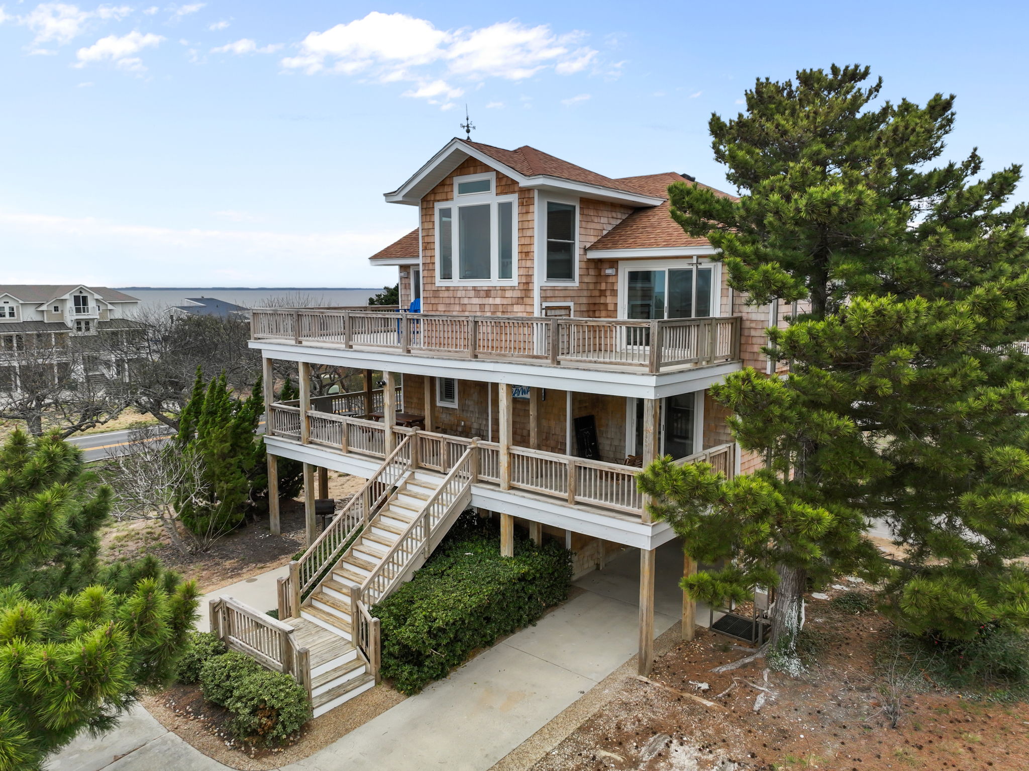 Side view showing the elevated design and plenty of outdoor space.