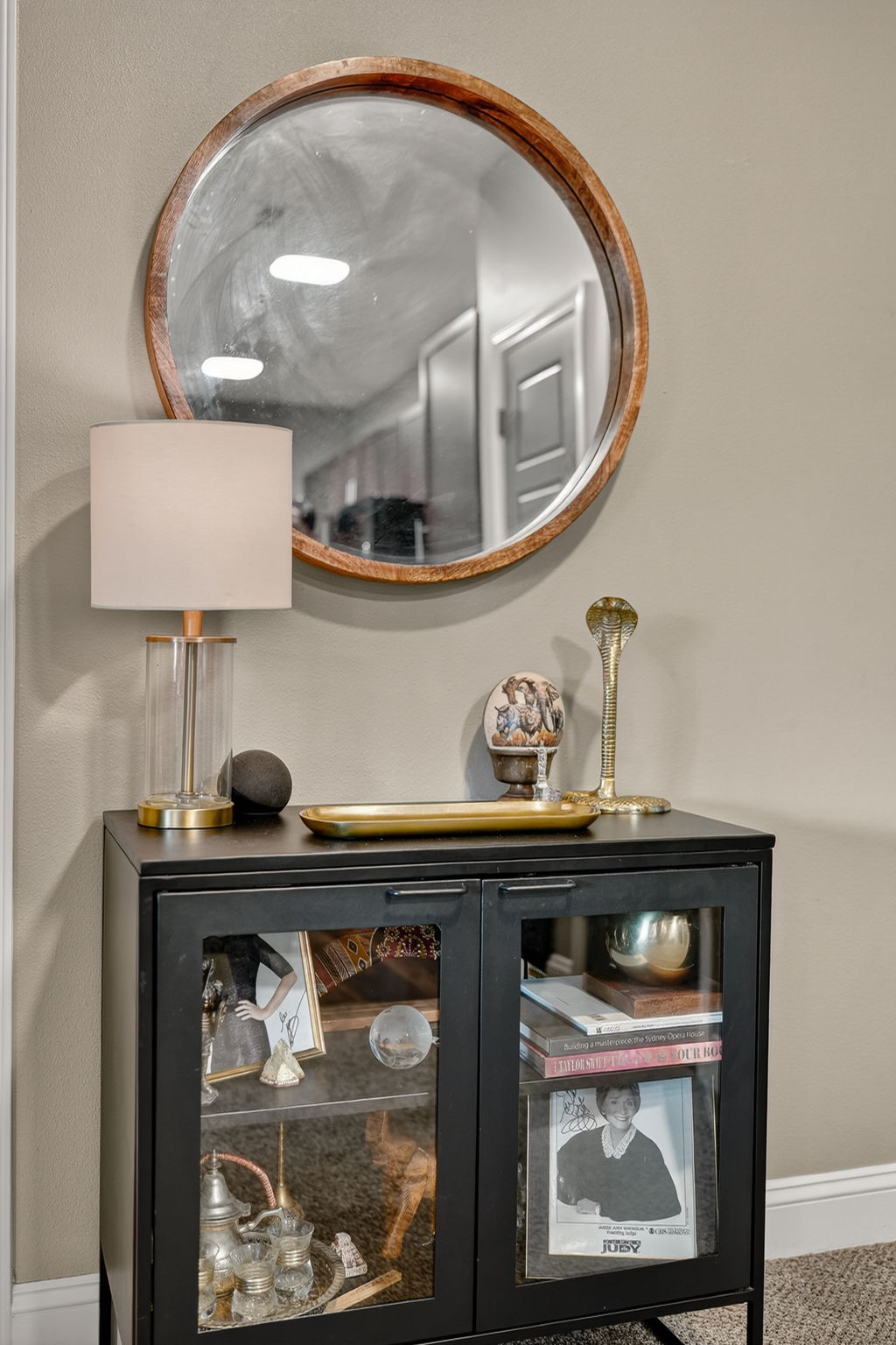 Step into style with a modern entryway featuring sleek console table, accent mirror, and curated décor.