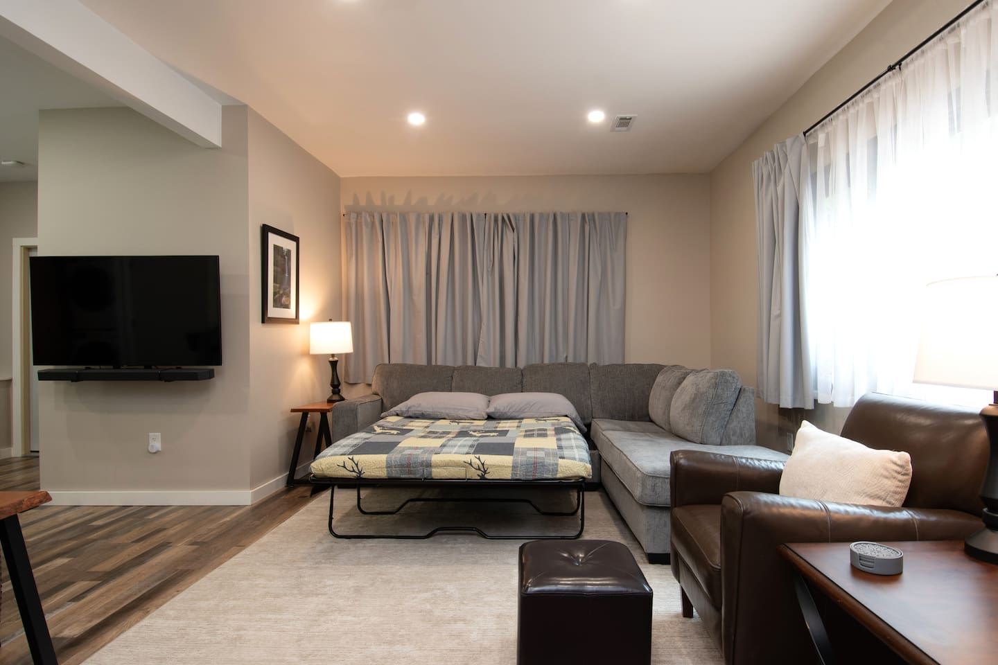 The TV can be moved to allow viewing from the bed.