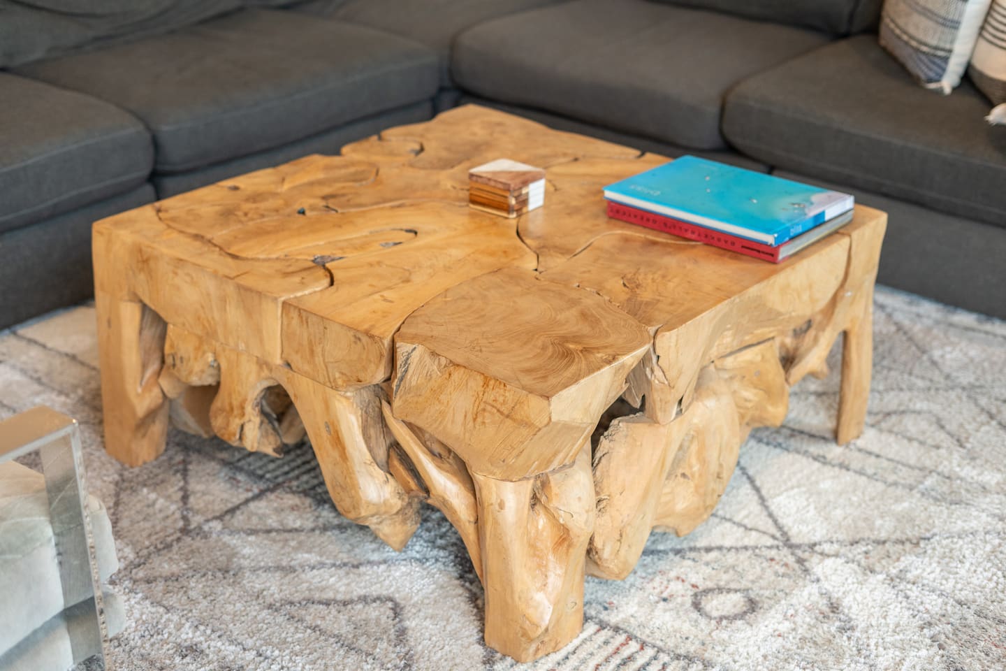 Handcrafted coffee table adds natural elegance.

