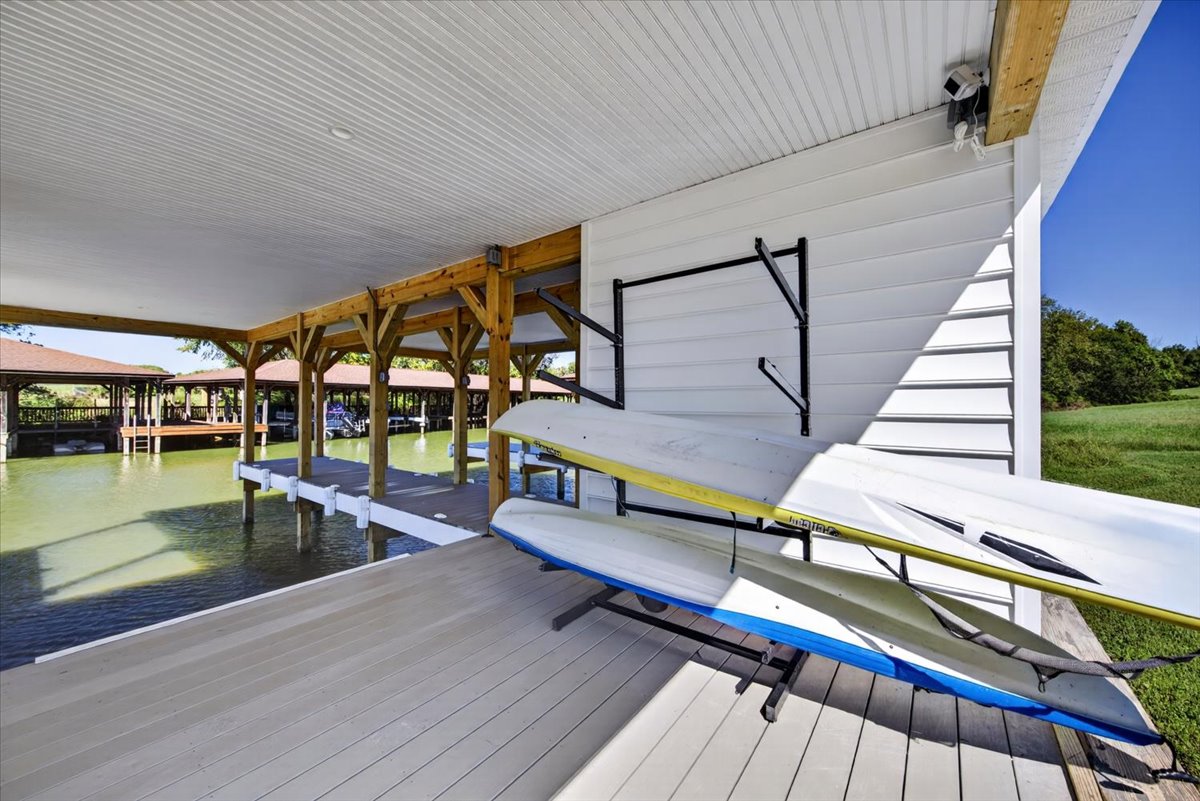 Convenient kayak and paddleboard storage located right at the boathouse.