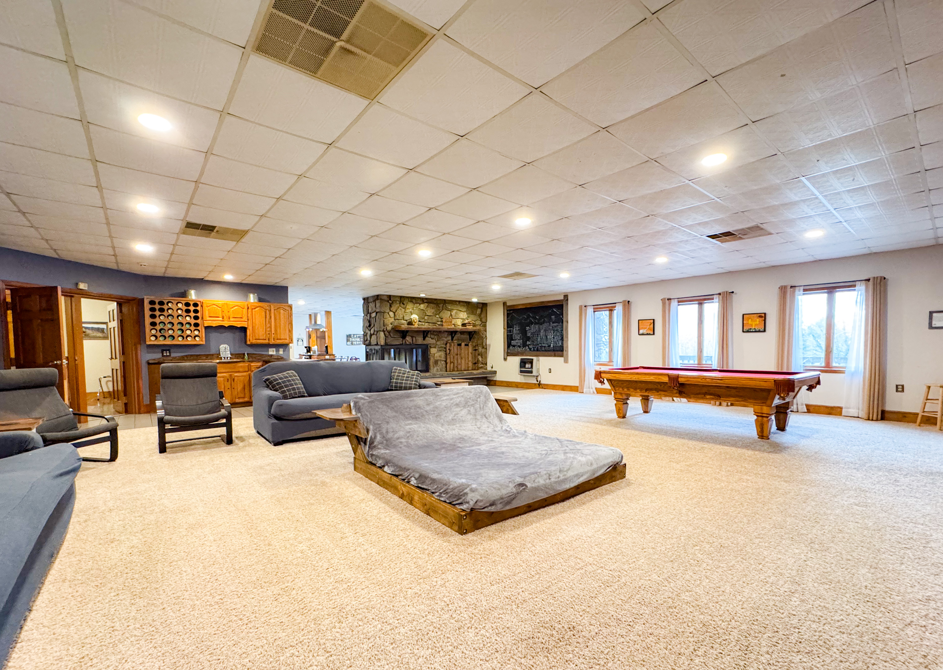 lower level living room complete with a custom lounger for the space!