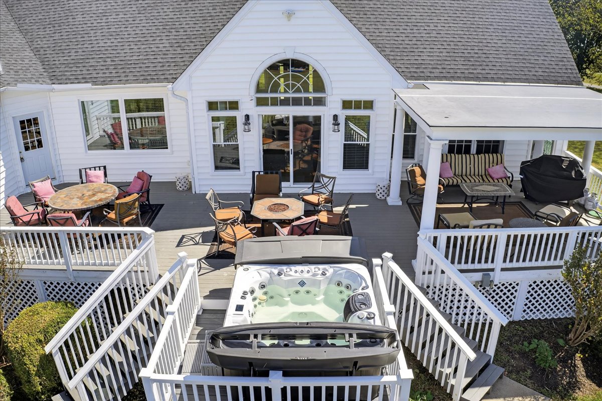 Relax in the hot tub, fire up the grill, or gather around the firepit — all just steps from the lake.
