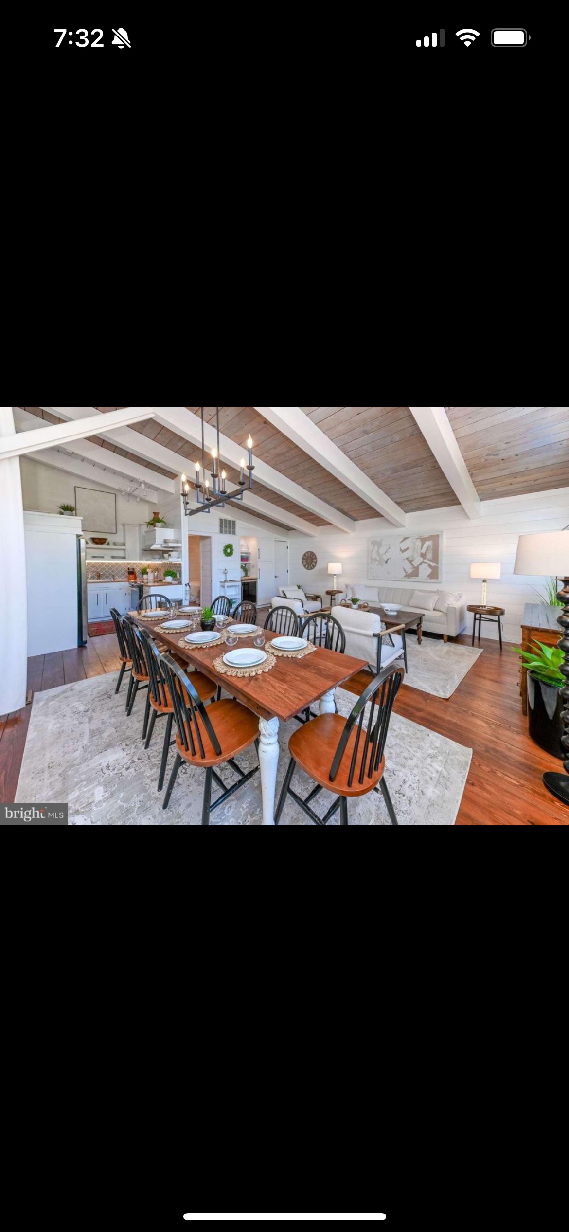 Charming beach cottage with gorgeous wood ceilings and shiplap throughout.